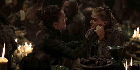 Catelyn wiping Sansa's face at the Winterfell feast in Game of Thrones