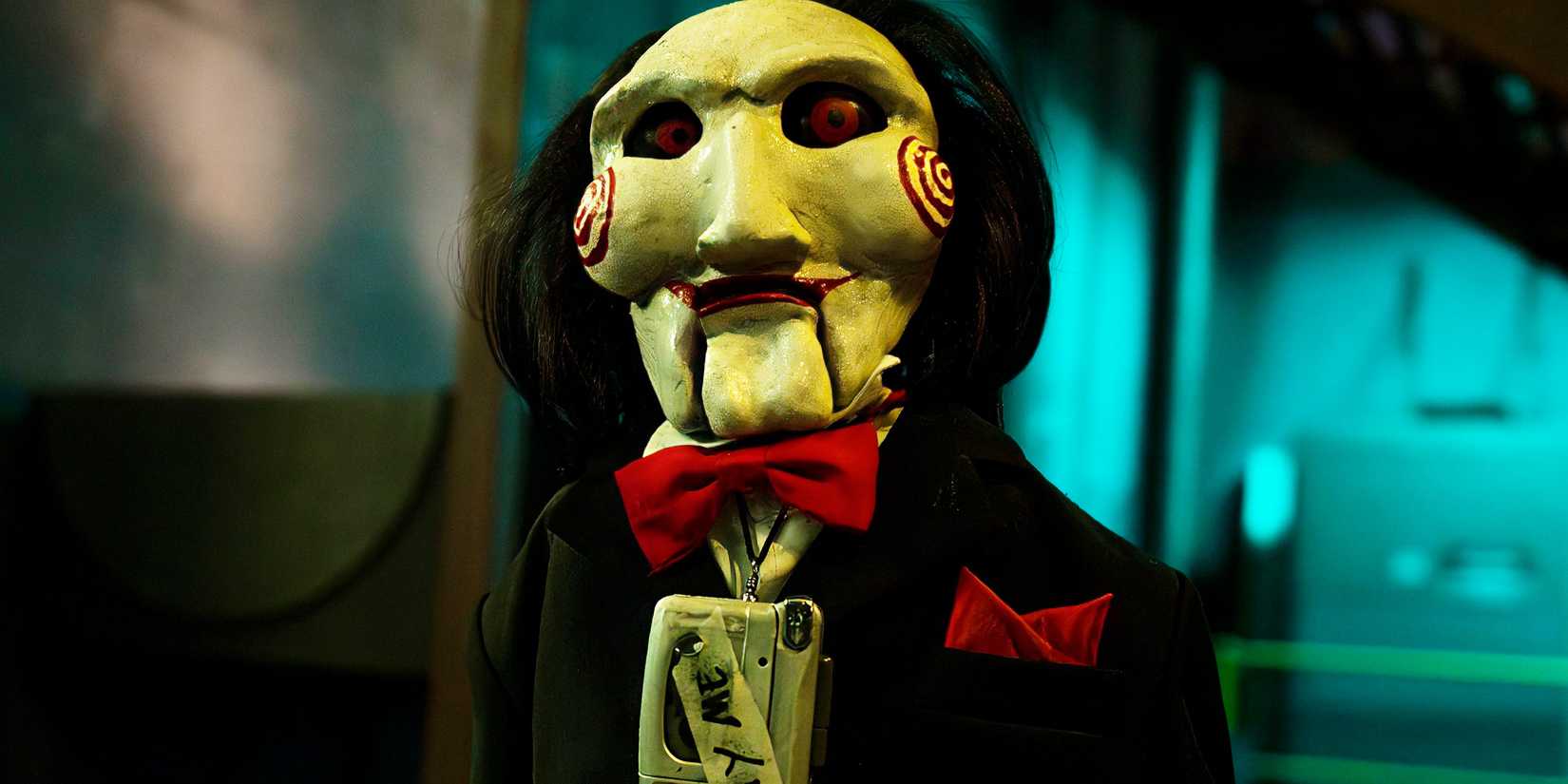 A closeup of Billy the Puppet in Saw X