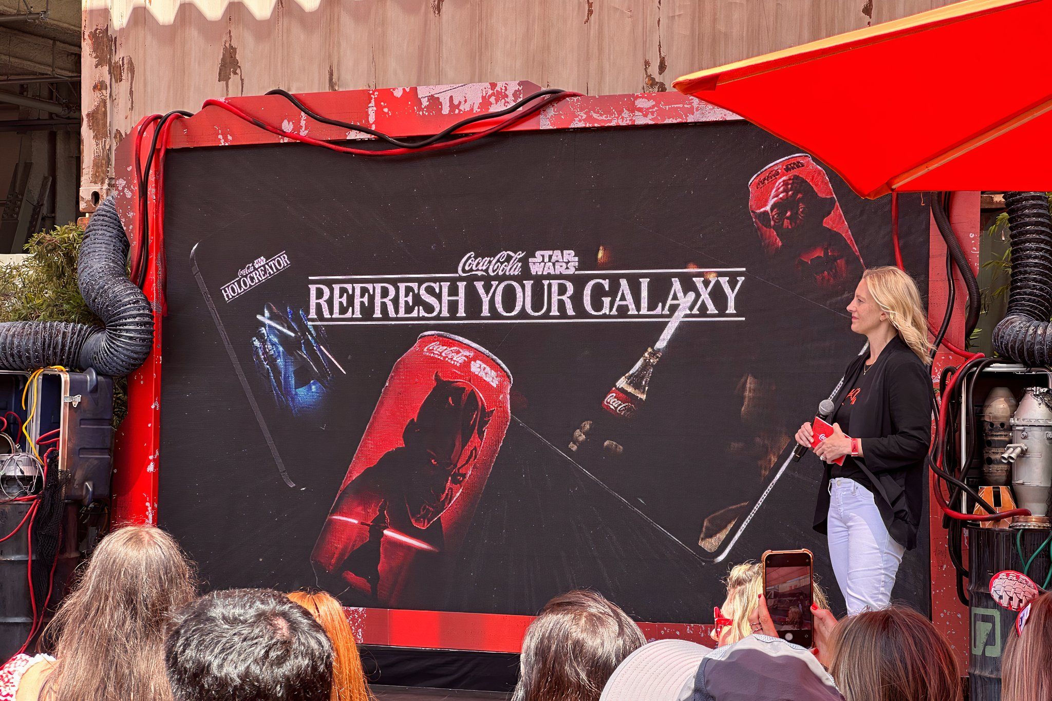 Coca-Cola cans showing Star Wars characters under a title that says Refresh Your Galaxy