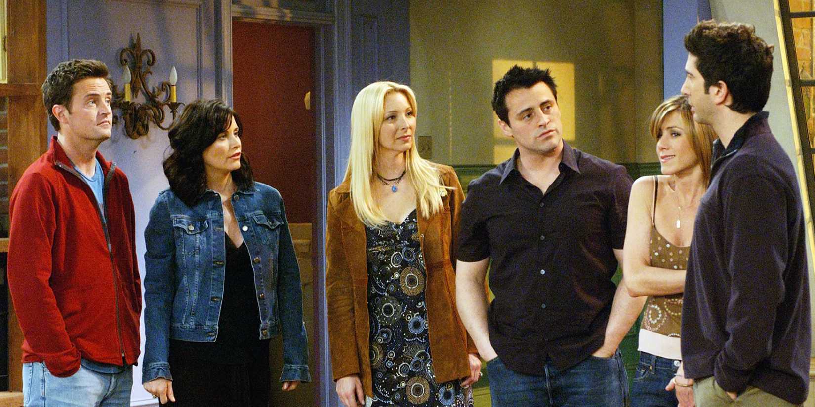 The cast of Friends in Monica and Chandler's empty apartment in the final episode.