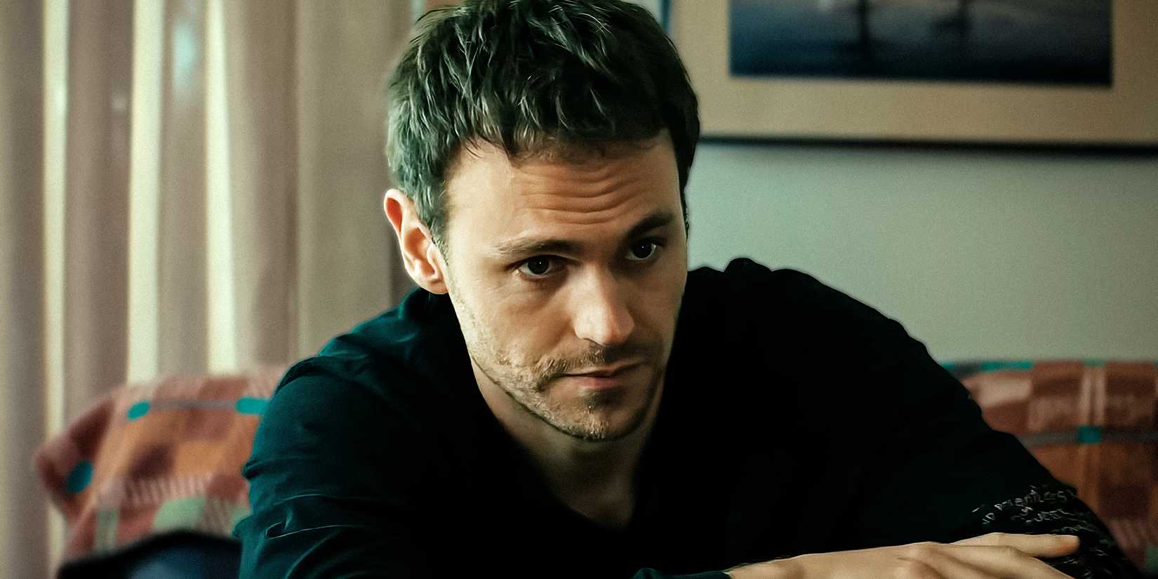 Kieran (Charlie Vickers) looks serious in Netflix's The Survivors