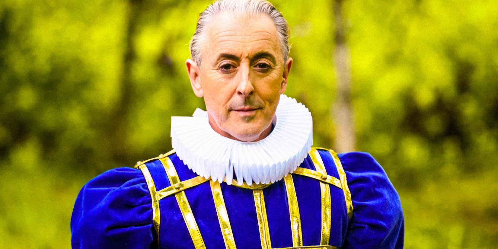The Traitors host Alan Cumming in an elaborate blue outfit