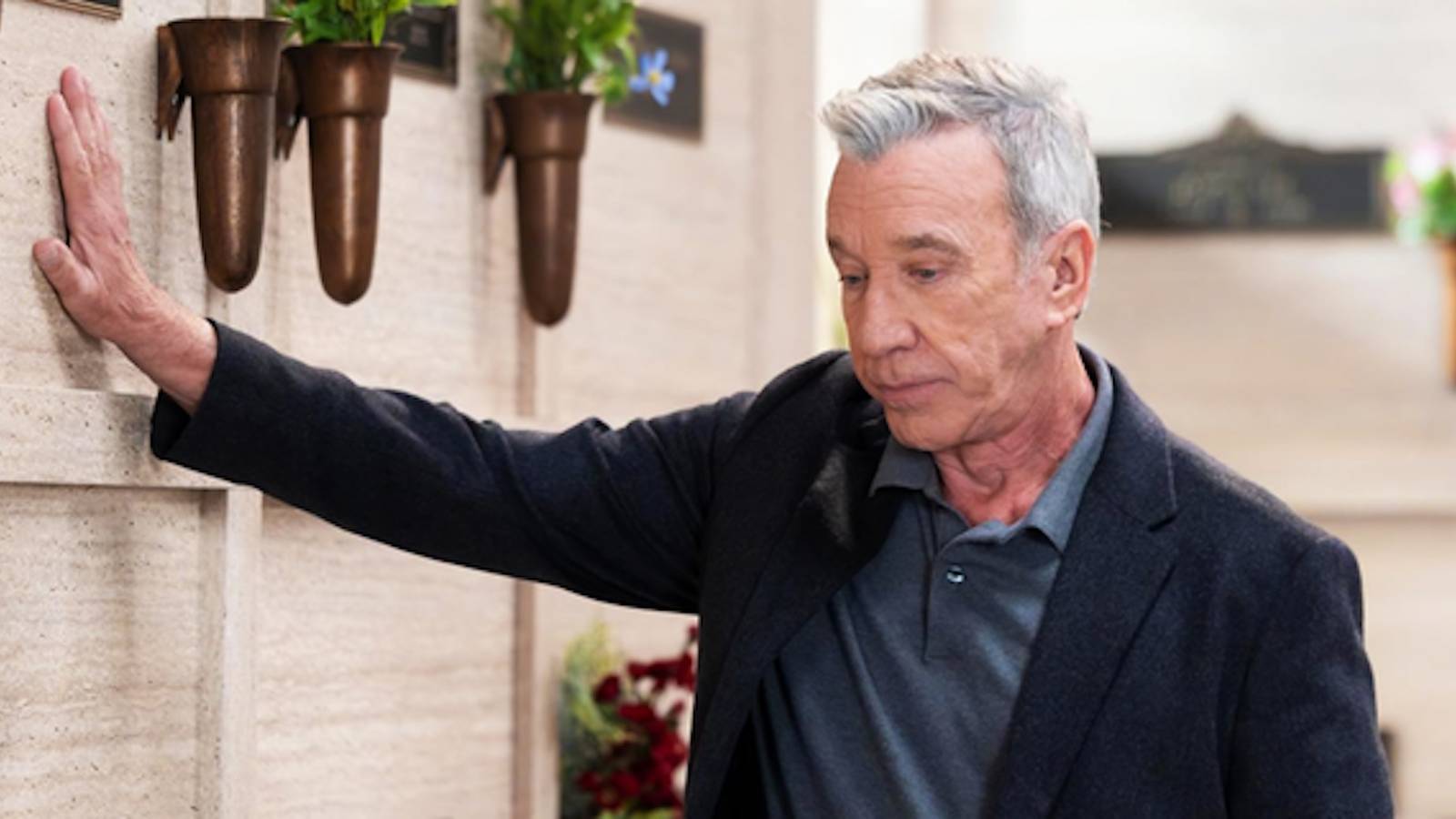 Tim Allen's Matt looks dejected in the auto shop from Shifting Gears season 1