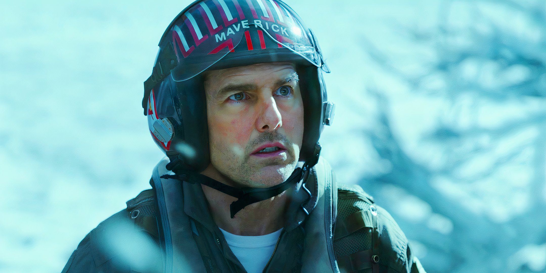 Tom Cruise looking worried in a snowy environment as Maverick in Top Gun Maverick