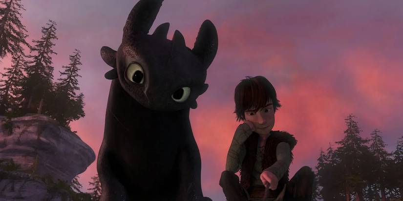 Iconic Dragon Characters in Movies and TV Shows 8 Toothless watches Hiccup draw in How To Train Your Dragon 2010
