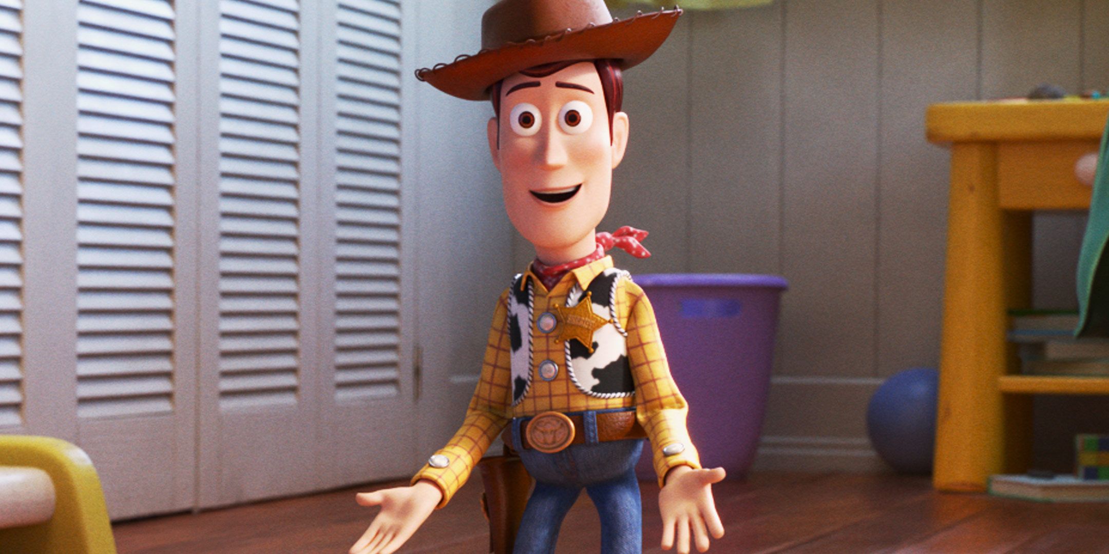 Woody smiling and standing in Andy's room in Toy Story 4