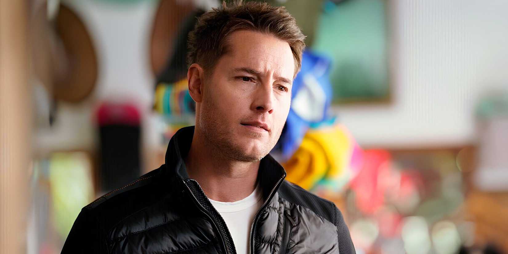 Colter (Justin Hartley) looking quizzically at something in Tracker