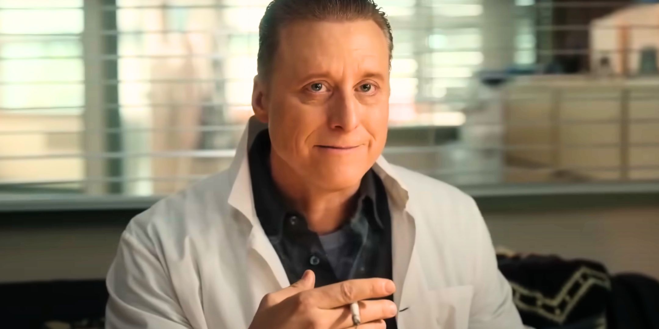 Alan Tudyk smoking as the Mantid in Resident Alien