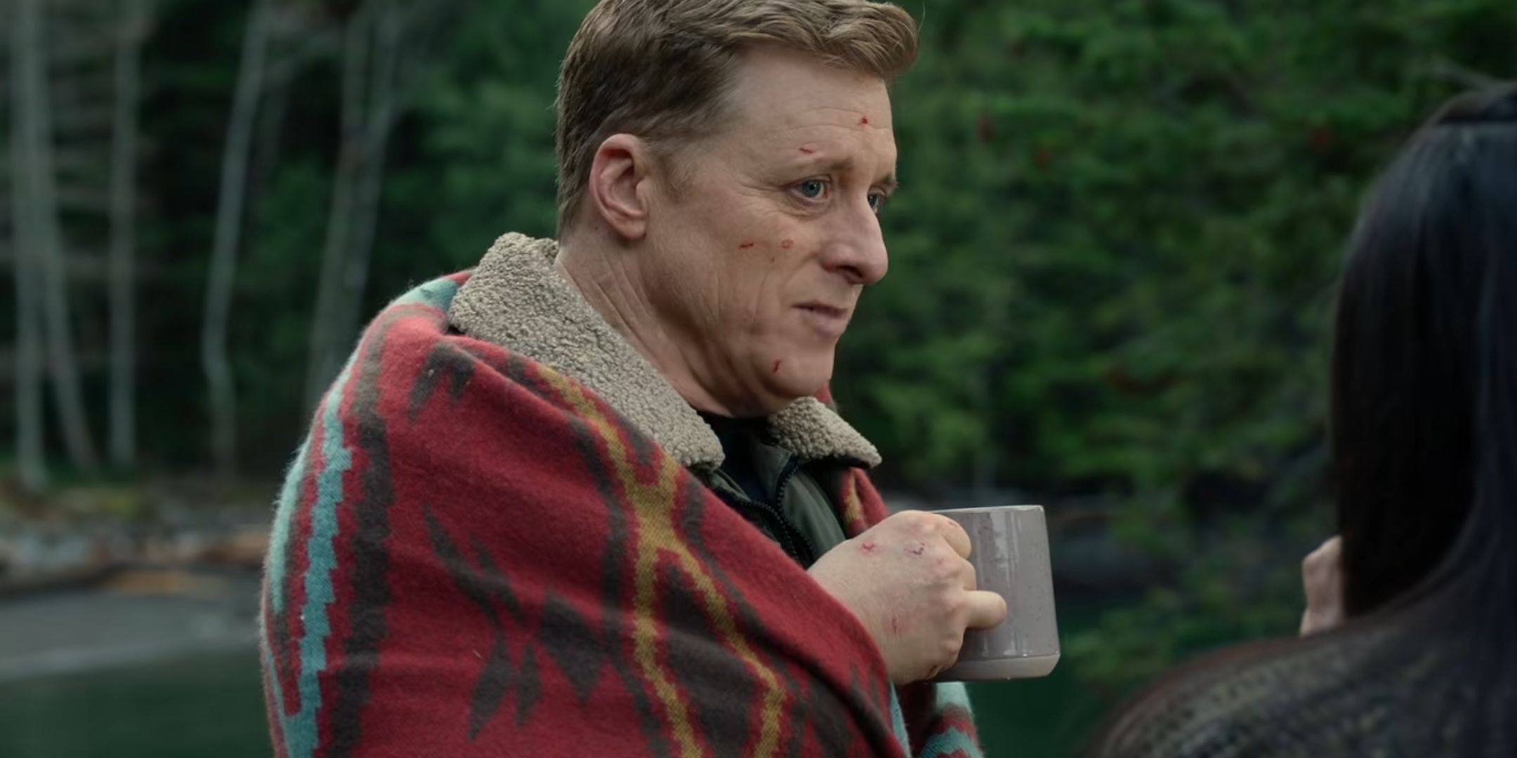 Alan Tudyk drinking coffee as Harry Vanderspeigle in Resident Alien