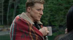 Alan Tudyk drinking coffee as Harry Vanderspeigle in Resident Alien