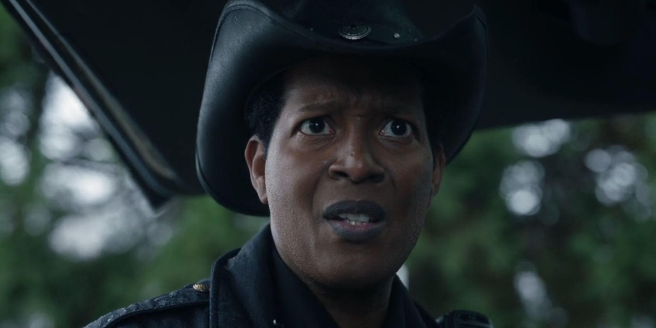 Corey Reynolds looking shocked as Sheriff Mike in Resident Alien