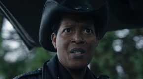 Corey Reynolds looking shocked as Sheriff Mike in Resident Alien