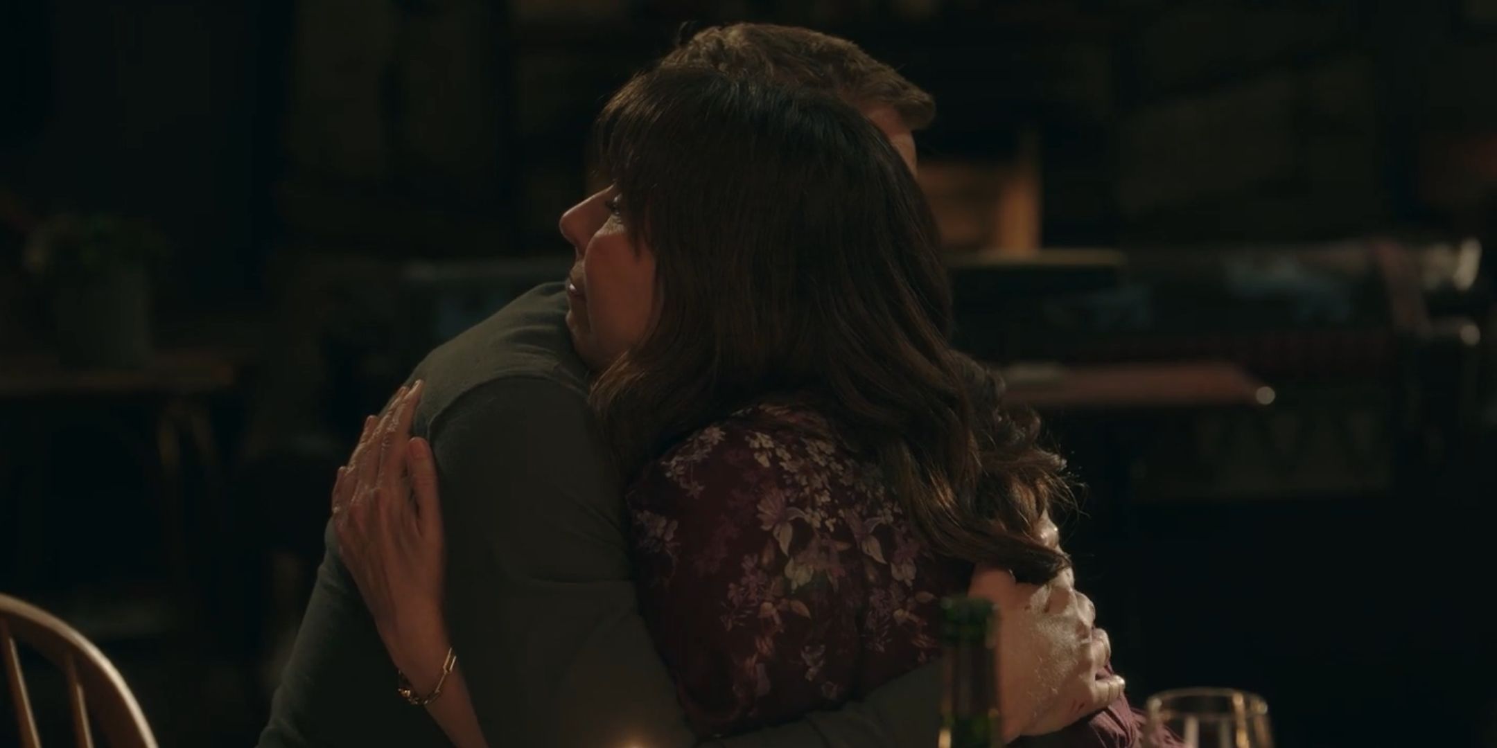 Harry and Heather hugging in Resident Alien