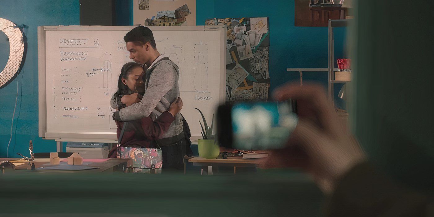 Someone secretly photographing Regé-Jean Page as Guy Braxton hugging Carrie in a classroom Waterloo Road.