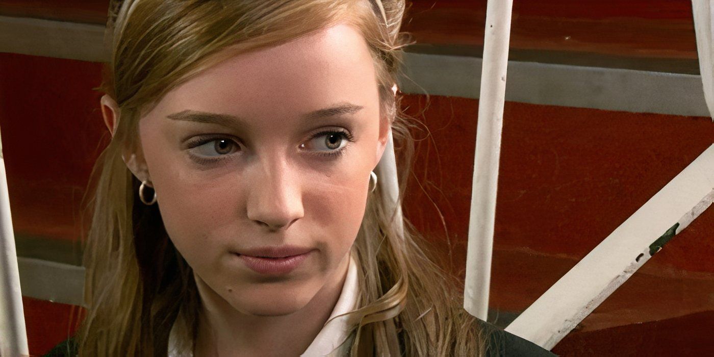 Phoebe Dynevor as Siobhan Mailey looking sad as she sits in the school stairwell in Waterloo Road.