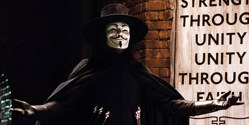 Hugo Weaving as V with his arms out in V for Vendetta