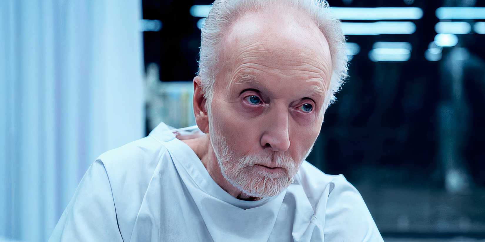John Kramer is a patient sitting in a room in Saw X
