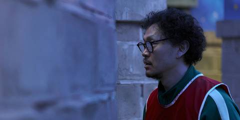 Yang Dong-geun as Park Yong-sik (Player 007)  in Squid Game season 3's hide and seek game