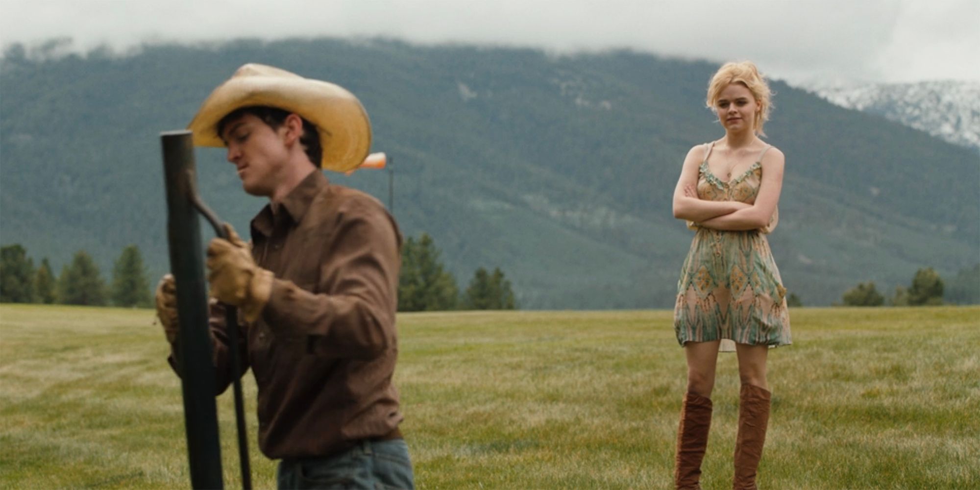 Young Beth watches Young Rip do chores in a Yellowstone flashback