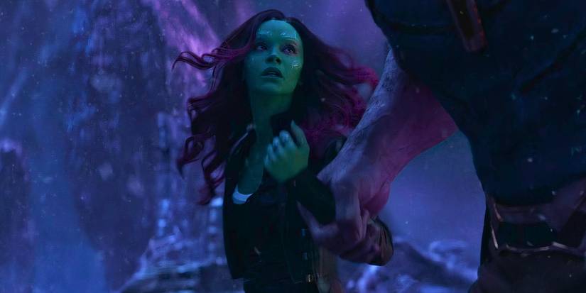 Zoe Saldana's Gamora is grabbed by the wrist by Thanos on Vormir in Avengers Infinity War (2018)