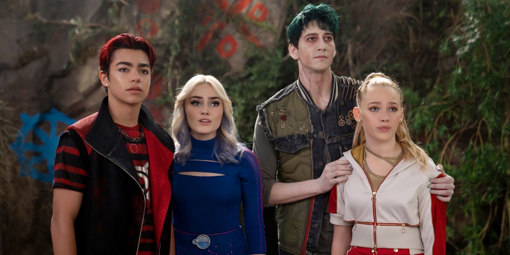 Malachi Barton, Meg Donnelly, Milo Manheim, and Freya Skye looking worried in Zombies 4: Dawn of the Vampires