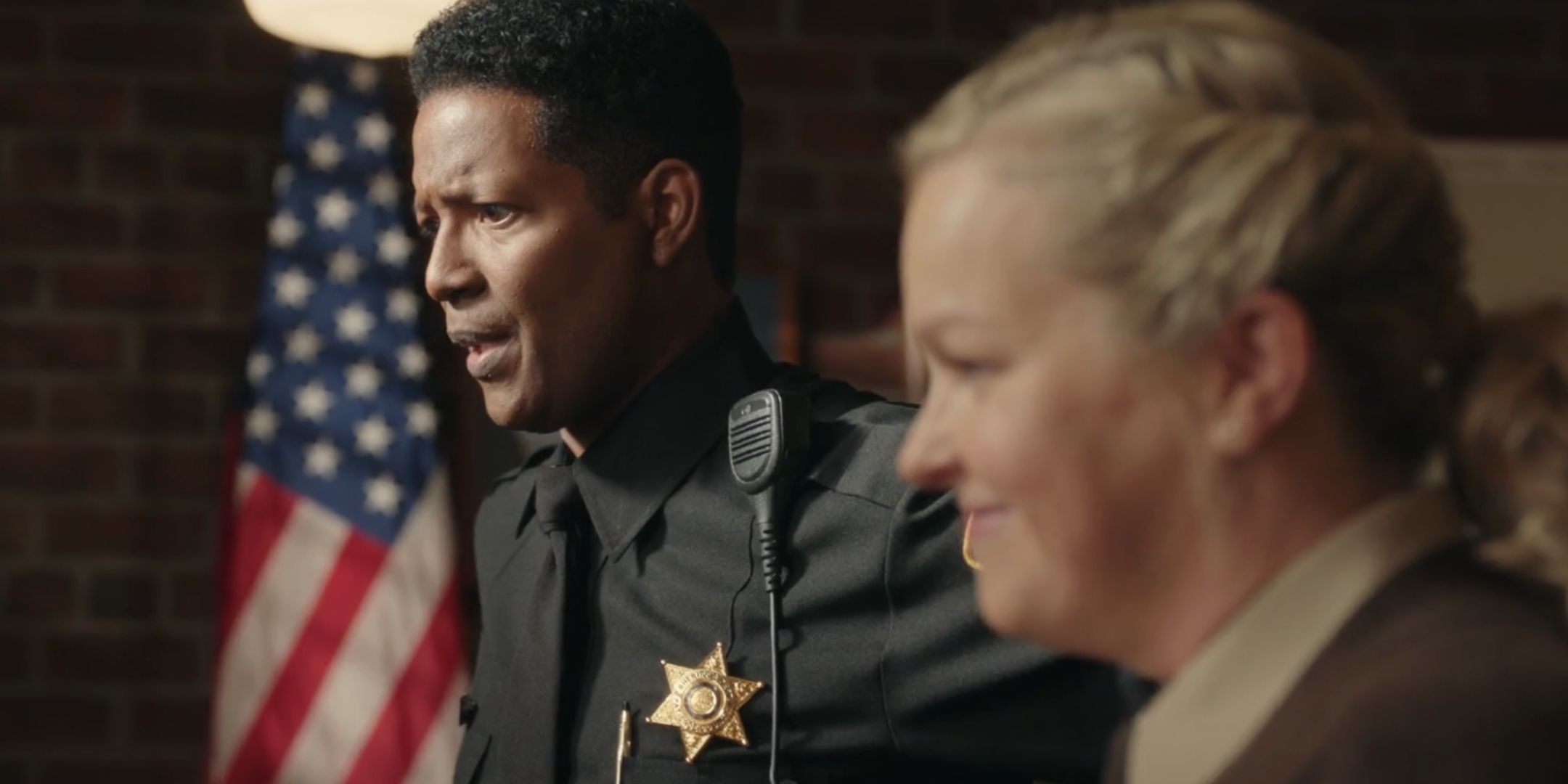 Mike looking shocked in Resident Alien
