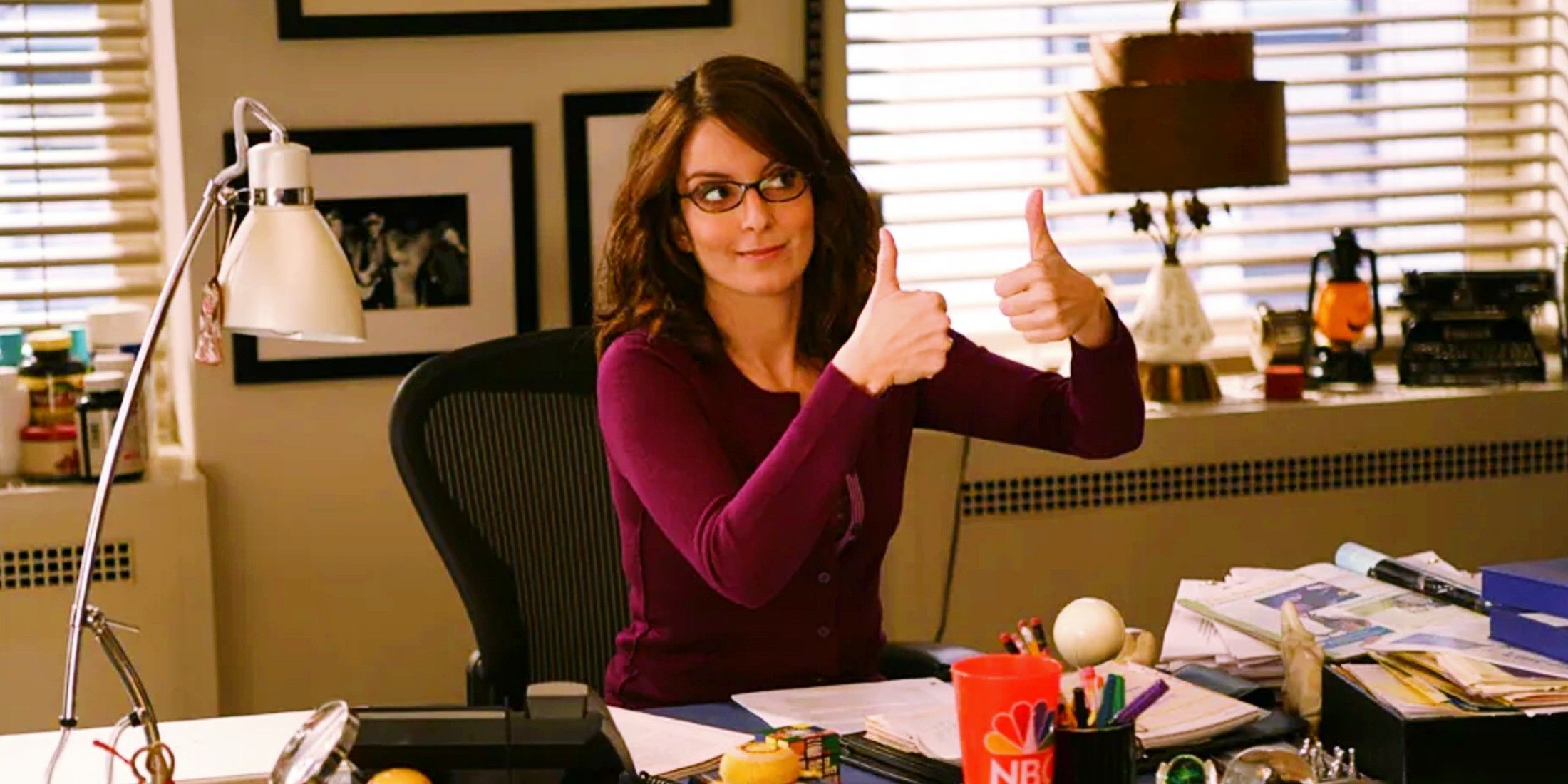 Tina Fey giving a thumbs-up in 30 Rock