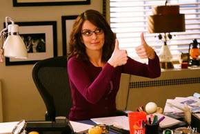 Tina Fey giving a thumbs-up in 30 Rock