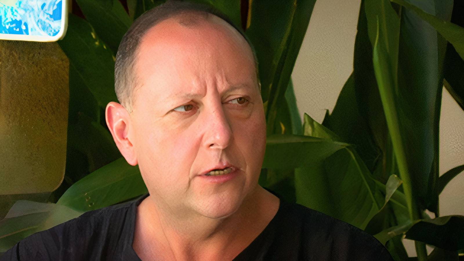 90 Day Fiancé's David Toborowsky looking confused in black t-shirt