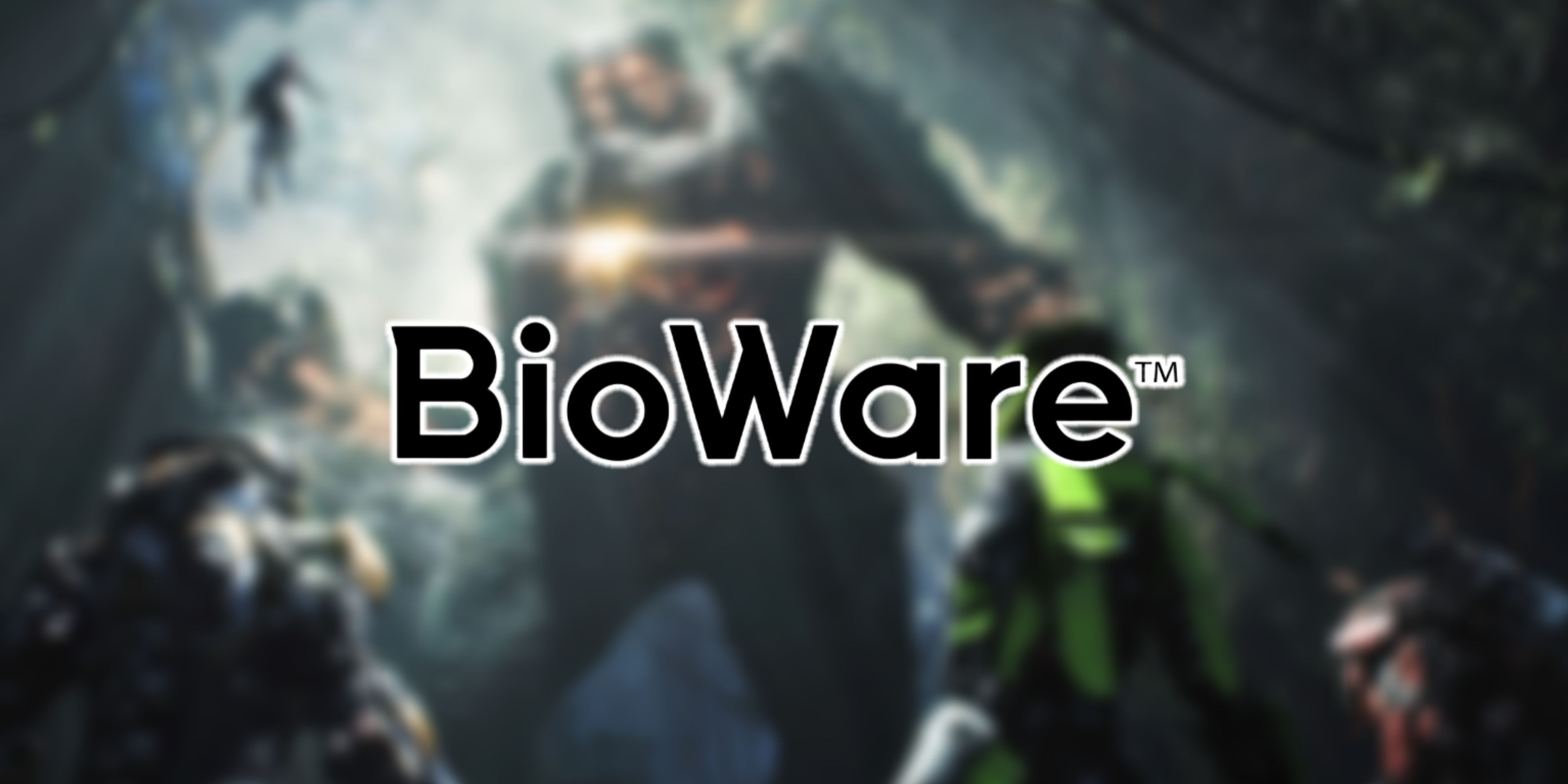 A blurred image of a forest scene from a video game with the Bioware logo._