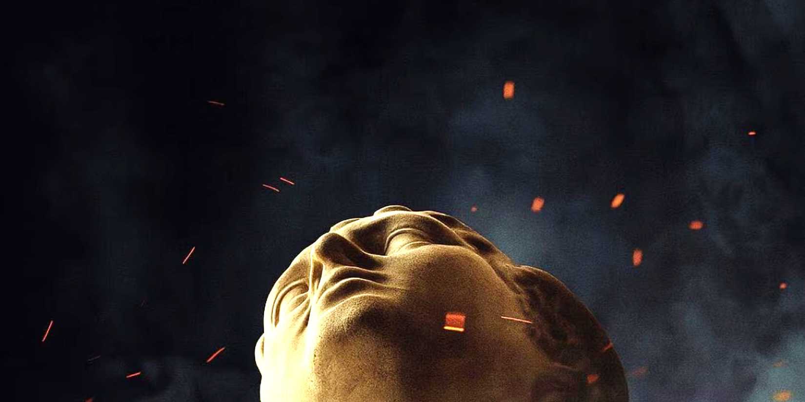 A statue looking upwards as ash and embers fly around it in The Odyssey poster