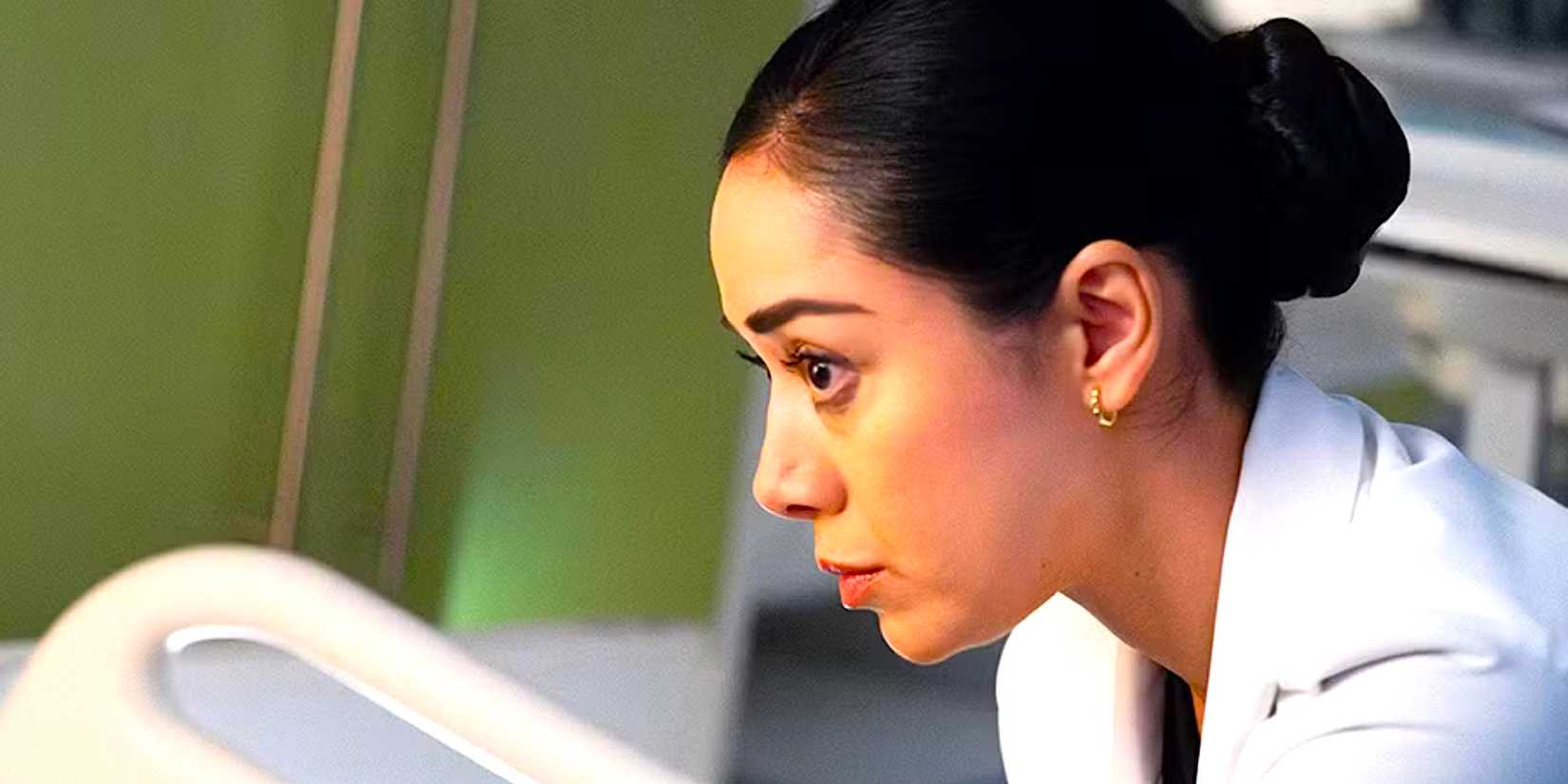 Aimee Garcia's Dr. Ochoa leans over a patient's bed in Criminal Minds Evolution season 3