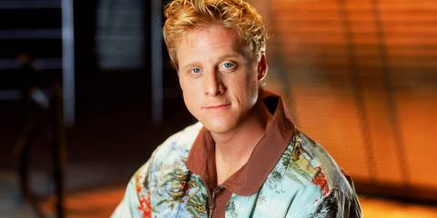 Alan Tudyk smiling slightly in Firefly