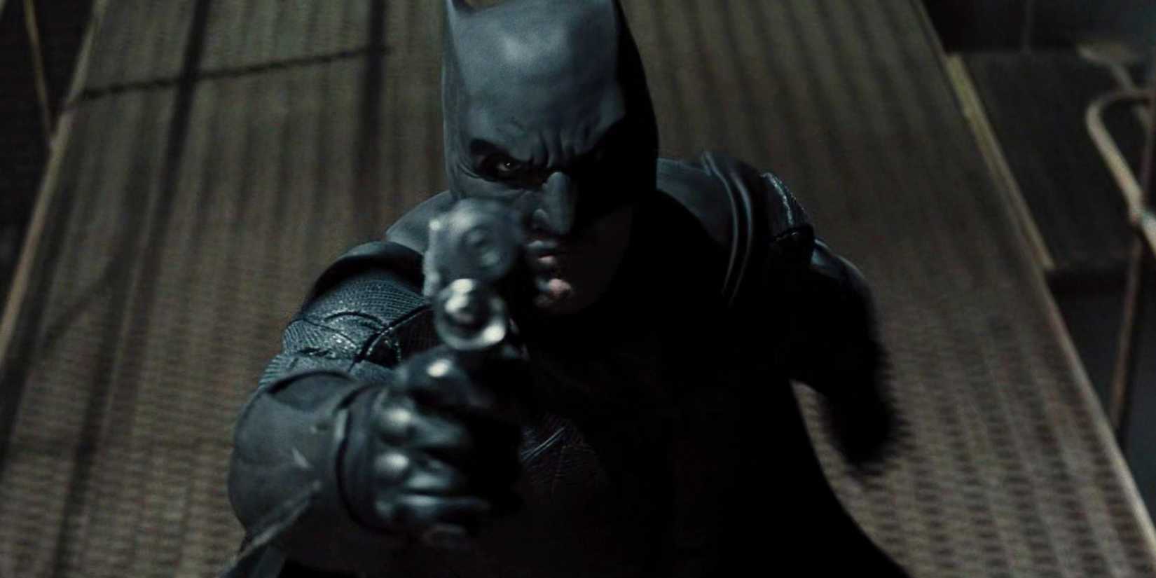 Ben Affleck's Batman firing his grappling hook at the camera