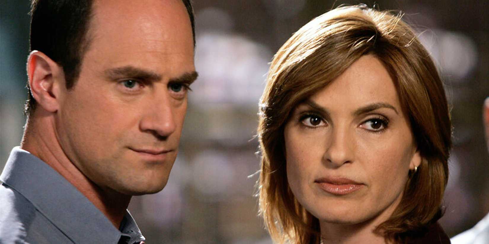 Elliot Stabler (Christopher Meloni) and Olivia Benson (Mariska Hargitay) looking at something off screen in Law and Order SVU