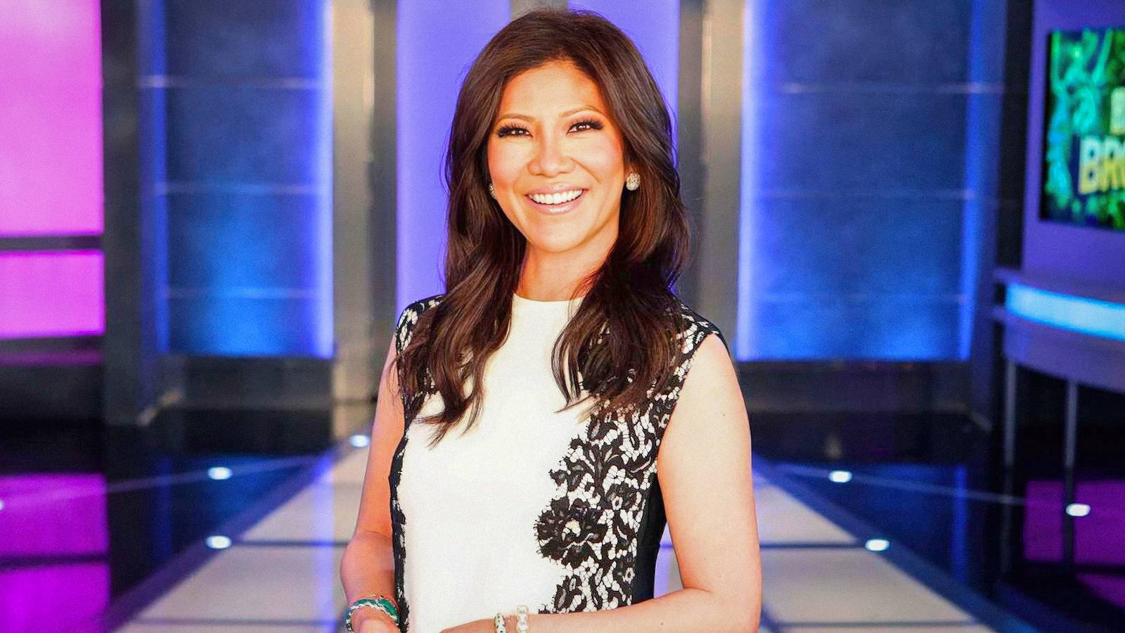 Big Brother host Julie Chen Moonves smiles while on stage