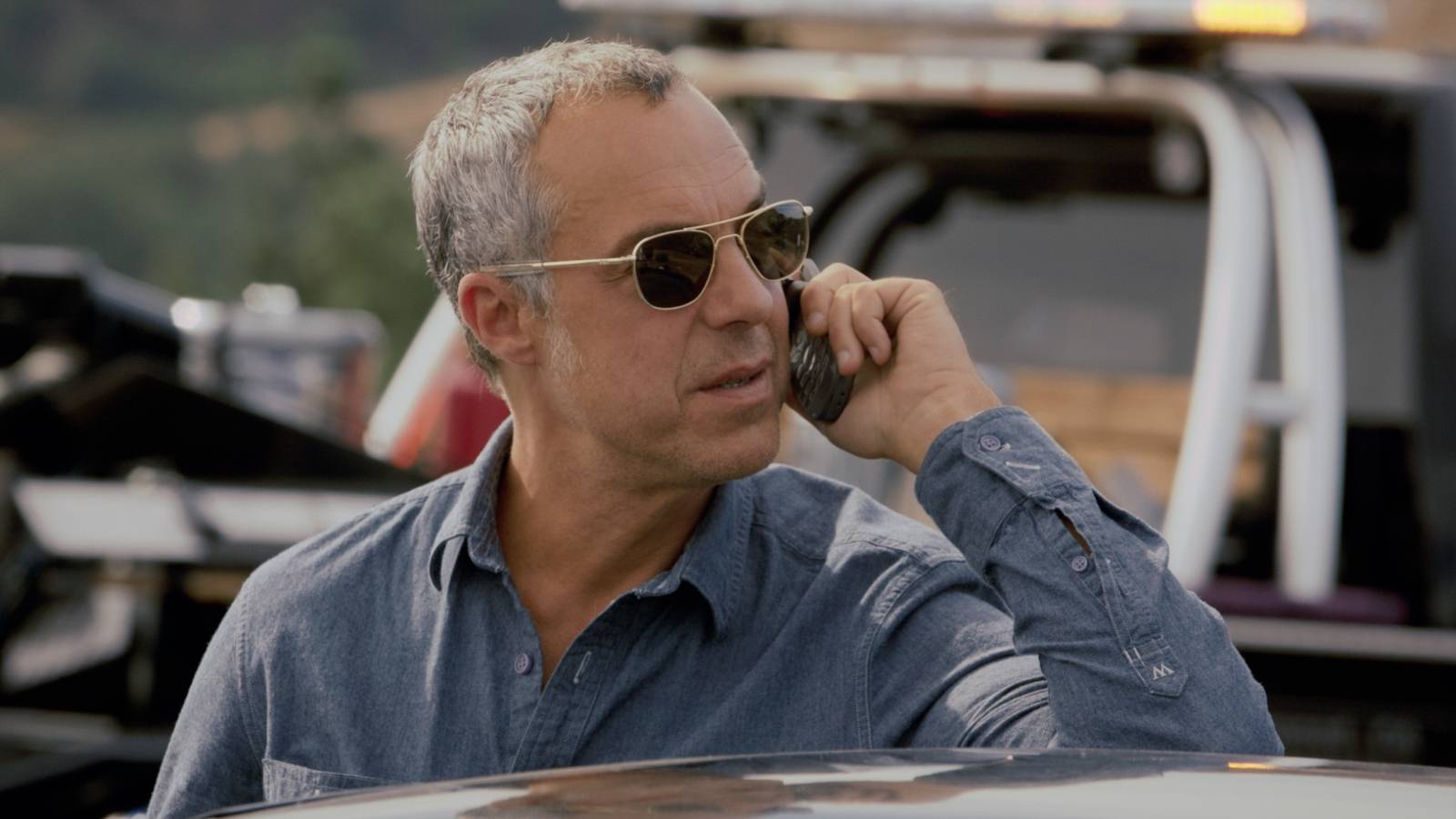 Bosch (Titus Welliver) talking on the phone in Bosch.