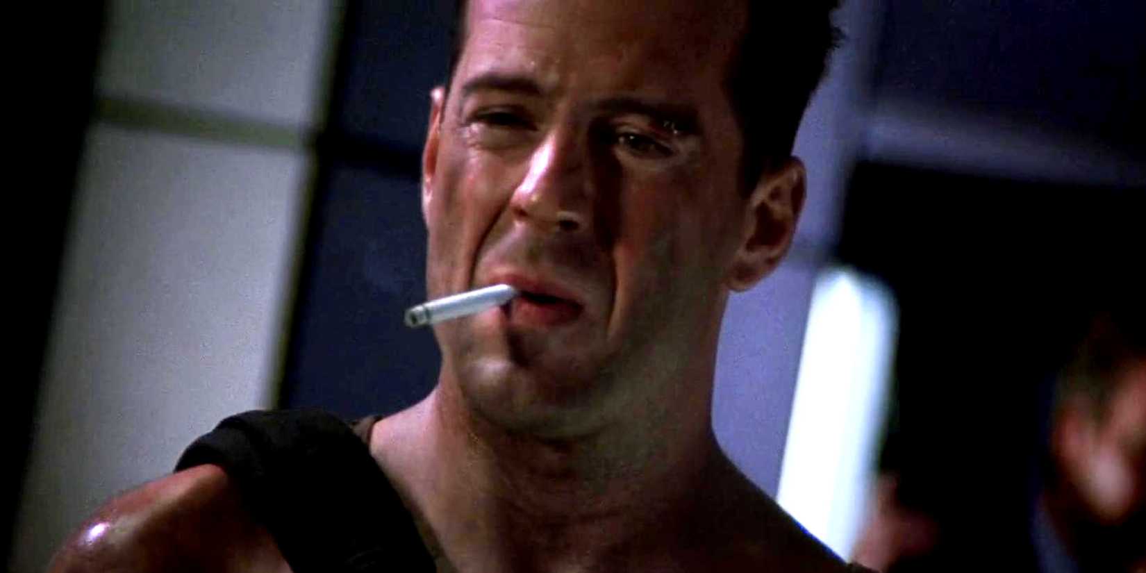 Bruce Willis' John McClane smokes a cigarette in Die Hard