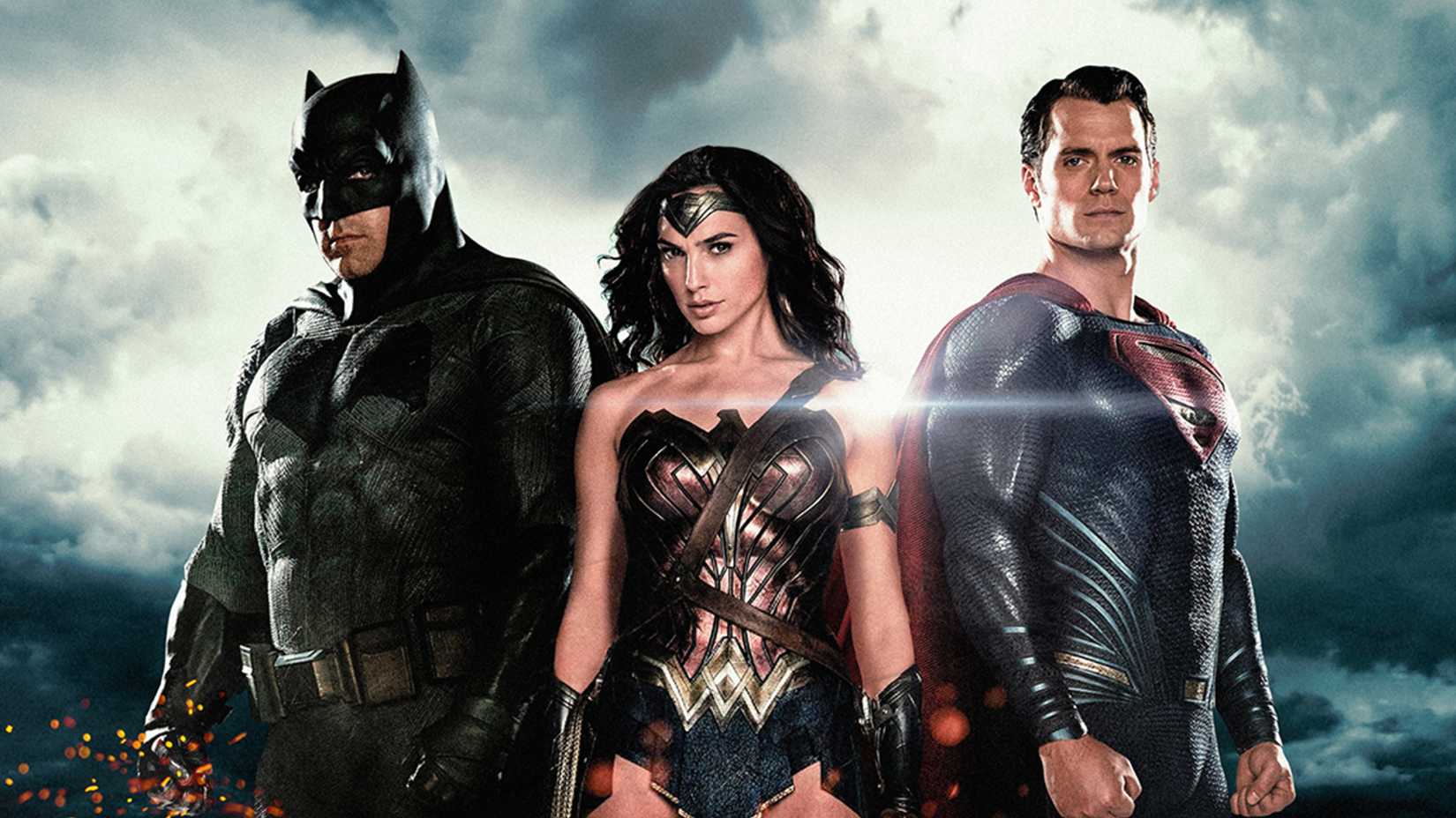 The DCEU trinity of Batman, Wonder Woman, and Superman in promotional material for Batman v Superman: Dawn of Justice (2016)