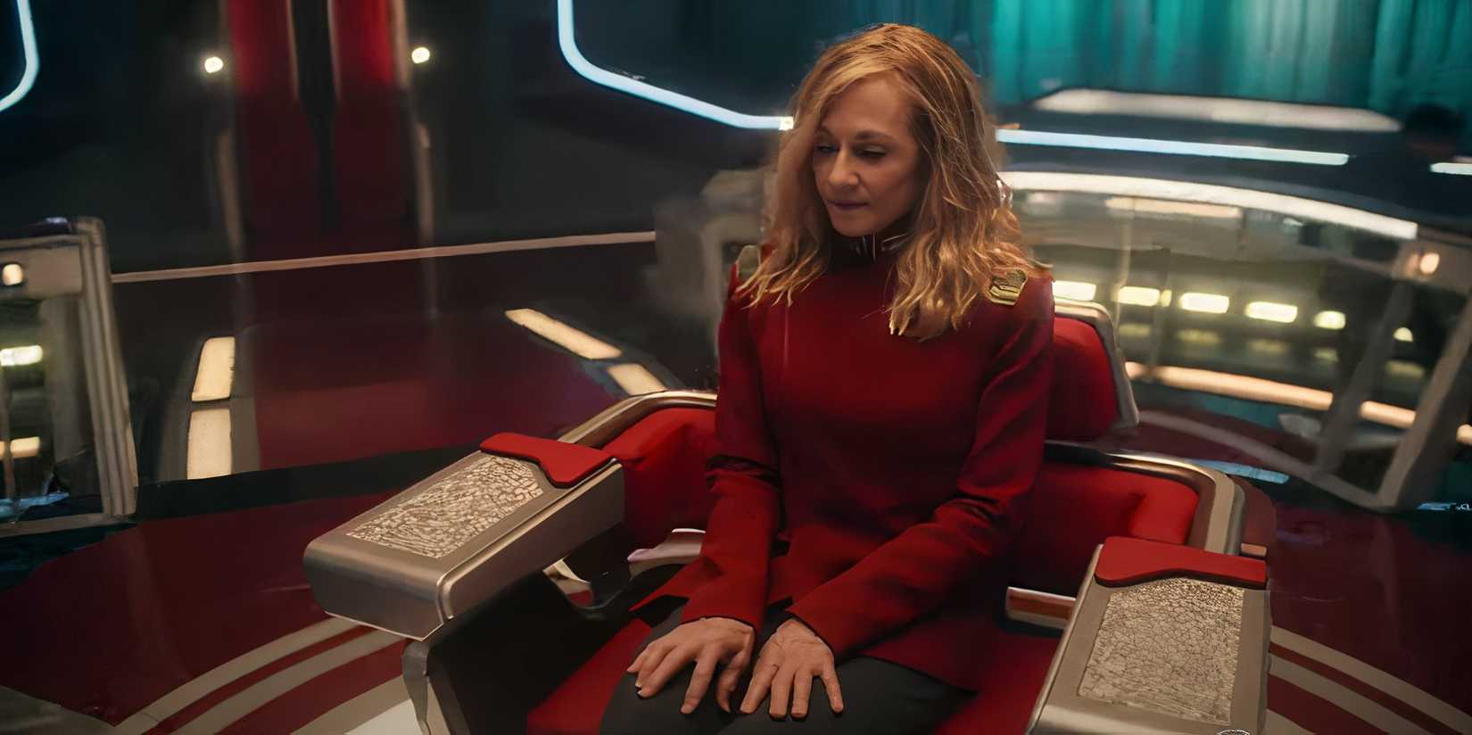 Captain Nara Ake sits in the captain's seat at Starfleet Academy.