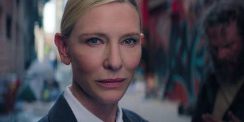 Cate Blanchett as the American recruiter smiling in Squid Game's series finale