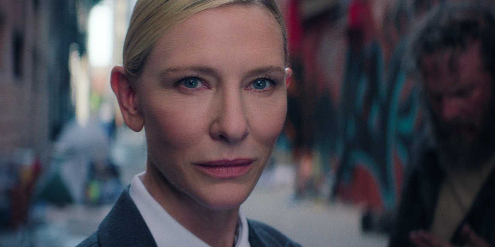 Cate Blanchett as the American recruiter smiling in Squid Game's series finale