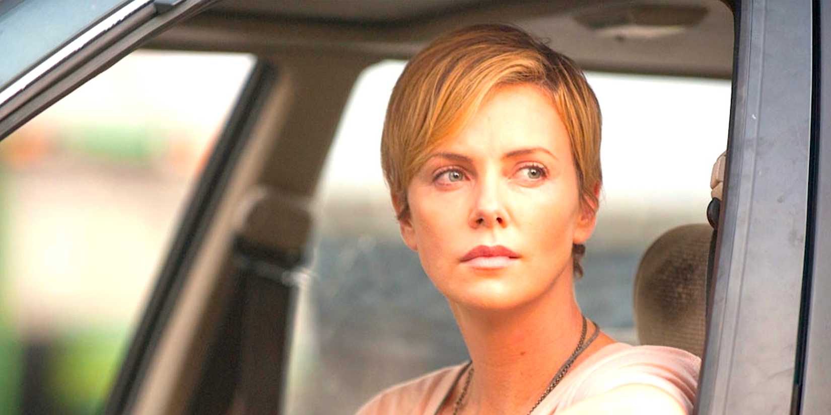 charlize theron s libby looks out a car window in dark places 2015
