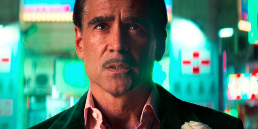 Colin Farrell lit in neon from behind in The Ballad of a Small Player