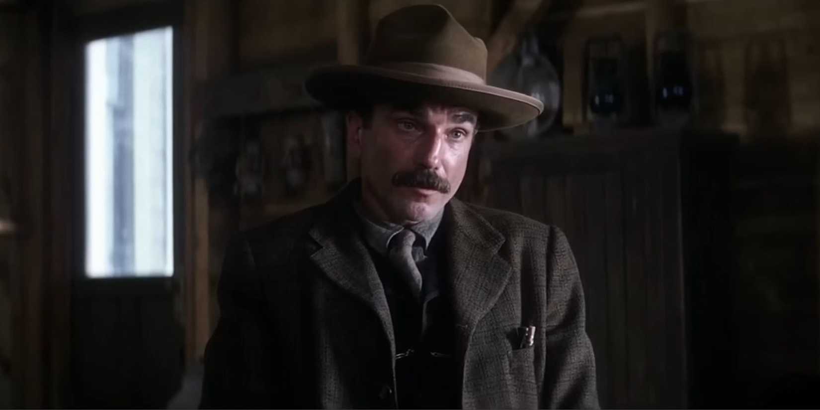 Daniel Day Lewis as Danielle Plainview in a house in There Will be Blood