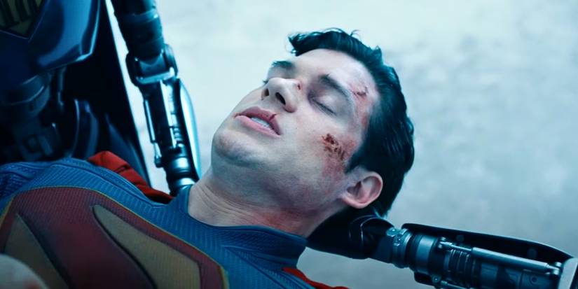 David Corenswet's Superman injured and carried by robots in the DCU Superman movie trailer