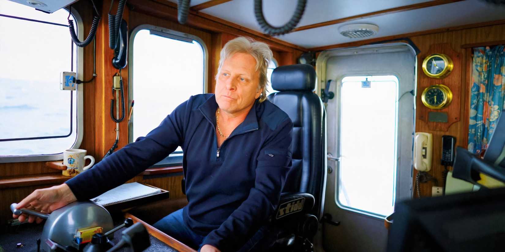 Deadliest Catch Sig Hansen inside cabin wearing blue hoodie