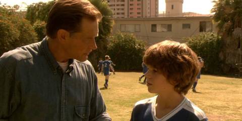 Harry Morgan (James Remar) and Dexter (Dominic Janes) on a soccer field in Dexter season 1, episode 4