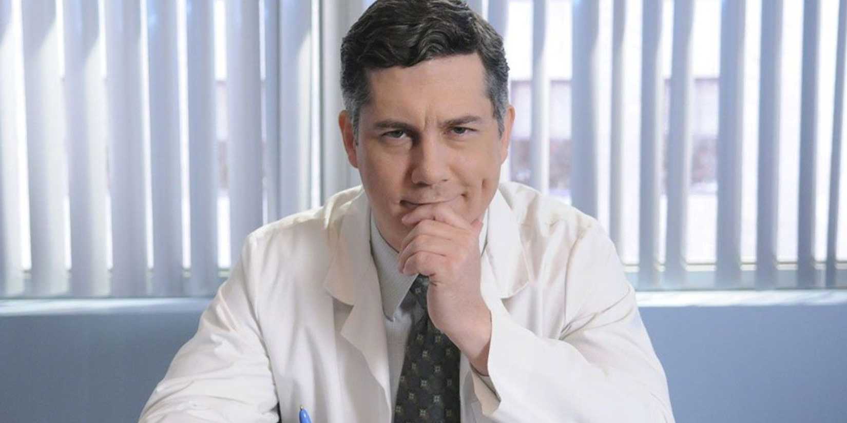 Dr Spaceman (Chris Parnell) sitting in his office in 30 Rock