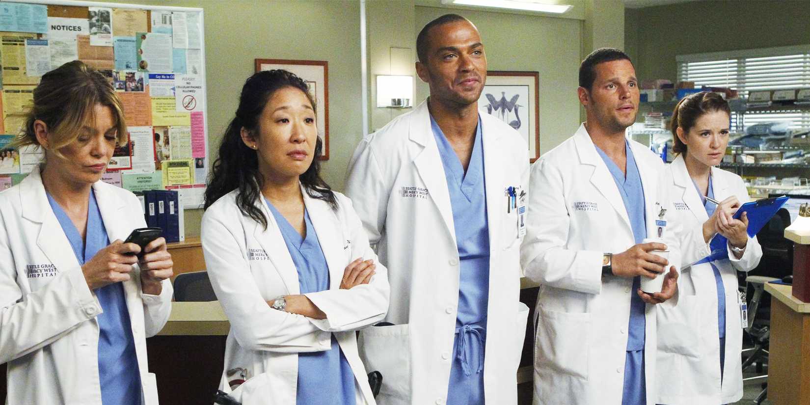 Meredith, Cristina, Jackson, Justin Chambers as Alex and Sarah Drew as April in Grey's Anatomy, listening intently